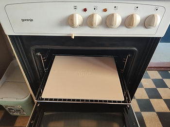 Cordorite pizza stone on a grill grate