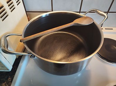 Wooden ladle across on top can prevent the pasta water from boiling over