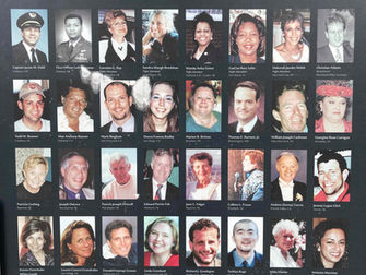 A display board shows photos of the 40 crew and passengers of Flight 93.