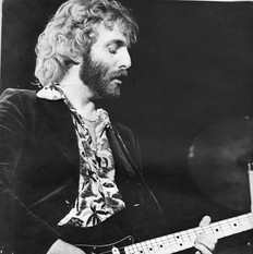 Andrew Gold and black Fender