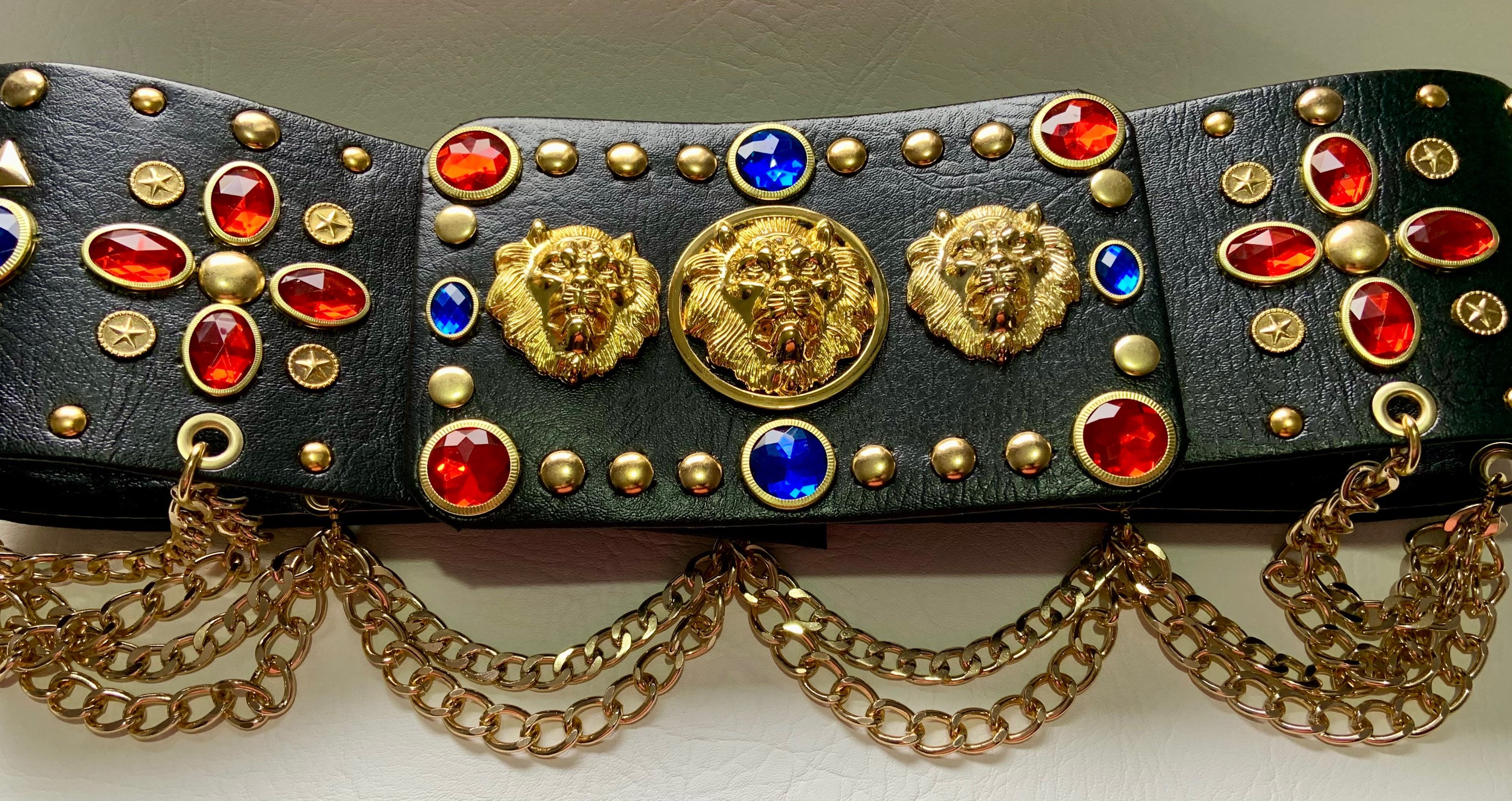 Triple lion head belt with red and blue stones