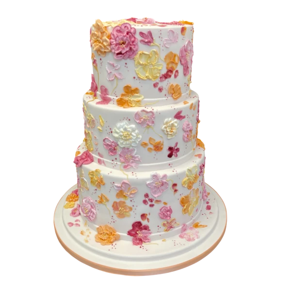 Three-tier wedding cake with vibrant sugar paste flowers in pink, orange, and white.