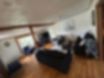 Living room seating area inside Sunset on the Shore cottage