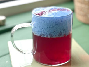 Functional latte menu at Happy Tea, a wellness tea bar in Amsterdam West