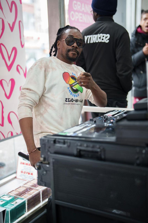 JP Schwmon in Stress Therapy Karaoke Party branded gear at store opening.