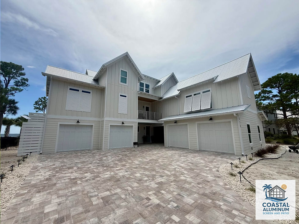Seamless gutter system custom-made and installed on a coastal home in Port St. Joe, Florida by Coastal Aluminum Screen and Patio