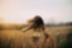 teenager running through field