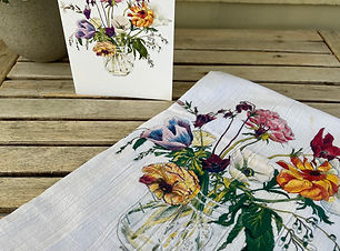 Tea towel and greeting card illustrated with a bouquet of flowers