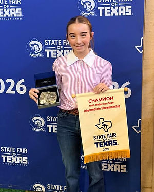 Rhemi Lutz Wins Grand Champion Show.jpg