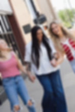 Refinery salon stylists walking downtown Cedar Rapids