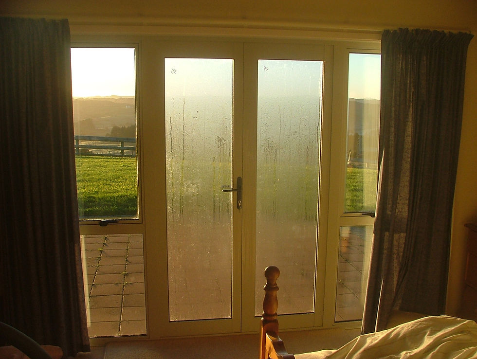 Condensation on inner doors which are single glazed compared to the side windows that have been double glazed