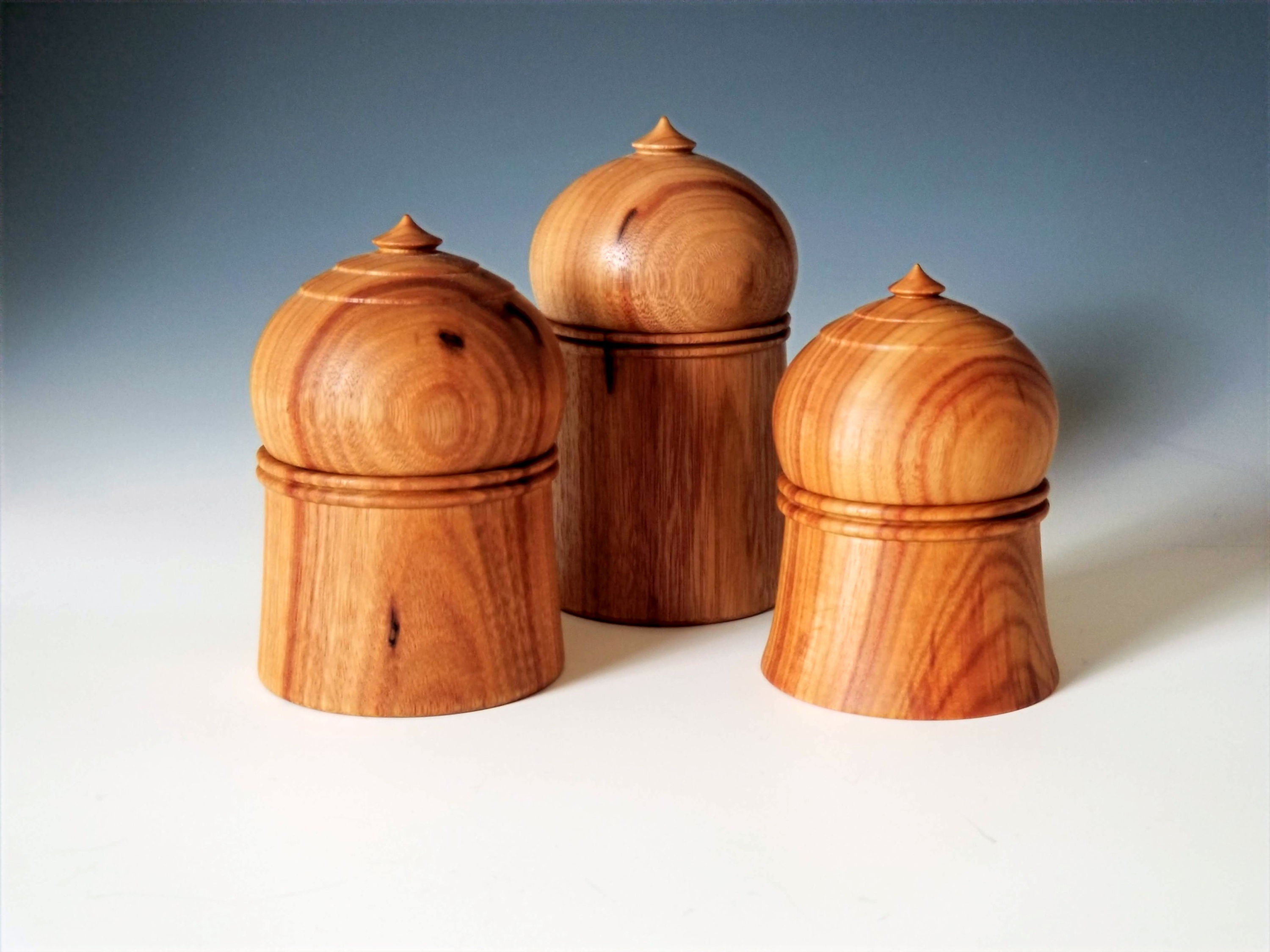 Lidded boxes in canary wood