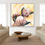 Thumbnail: Three large Proteas Flowers on yellow background, hung on a lounge wall between two sofas