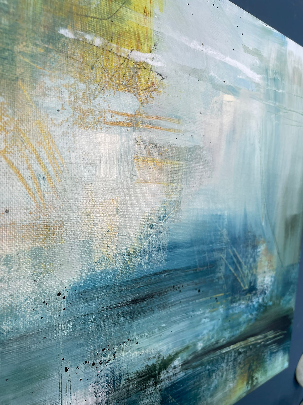Thumbnail: An abstract painting with dark blues, blacks & paler at the top with hints of dark green & yellow detail marks