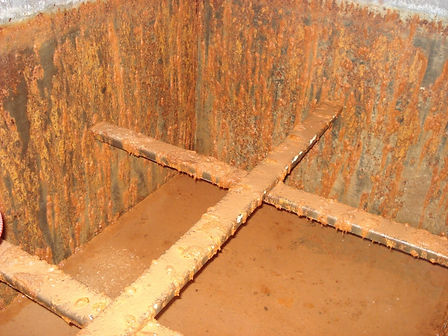 Cold Water Storage Tank with Heavy Corrosion