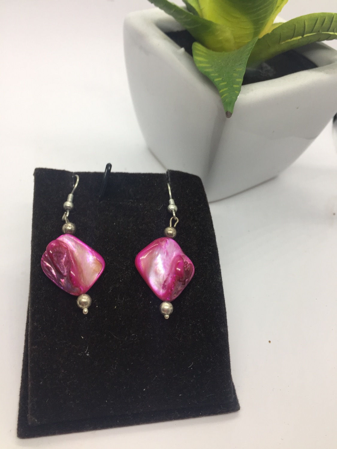 Pink twisted drop earrings