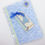 Thumbnail: Blue New Baby card with gingham teddy