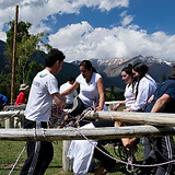 Team building exercise with logs