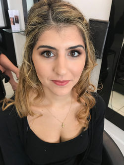 Soft skin and smokey eye.