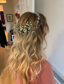 Wedding hair with real flowers.