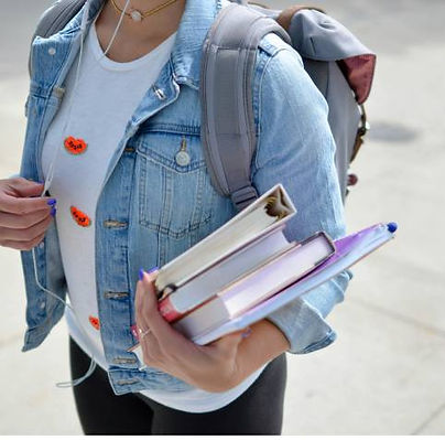 student carrying books.jpg