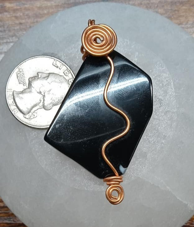 Onyx pendant with leather cord