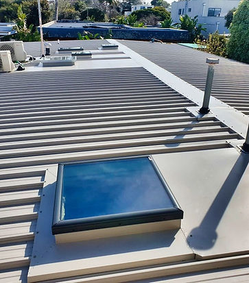 Replaced old metal roof in Beaumaris with new dune colorbond, replaced old skylights with