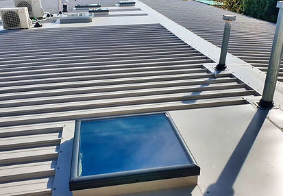 Replaced old metal roof in Beaumaris with new dune colorbond, replaced old skylights with