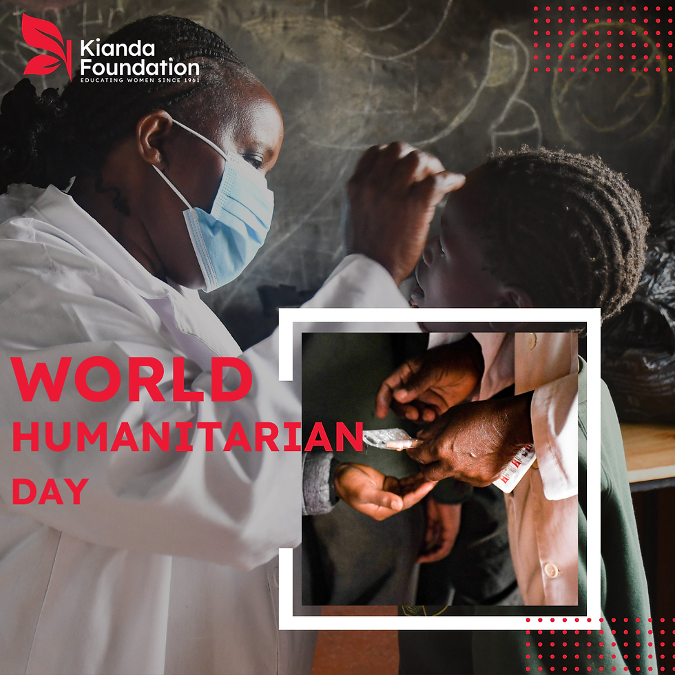 Healthcare worker in a mask examines a child in a classroom. Text reads: World Humanitarian Day. Kianda Foundation logo present.