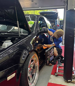 Dent Repair Technician working on VW door