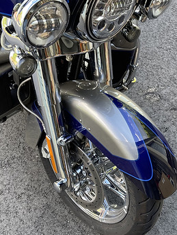 Front Fender of a Harley Davidson with a Dent