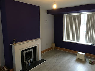 Living room painted, fresh painted home, fireplace and feature wall