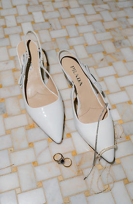 Brides shoes at wedding reception.  