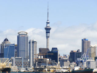Auckland, 2026. The cranes are still up, but the cost of what they build has risen faster than the value of what already stands.