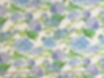 hydrangea fabric with white background and tape measure
