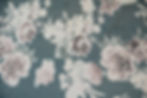 Teal blue silk chiffon rose fabric closeup