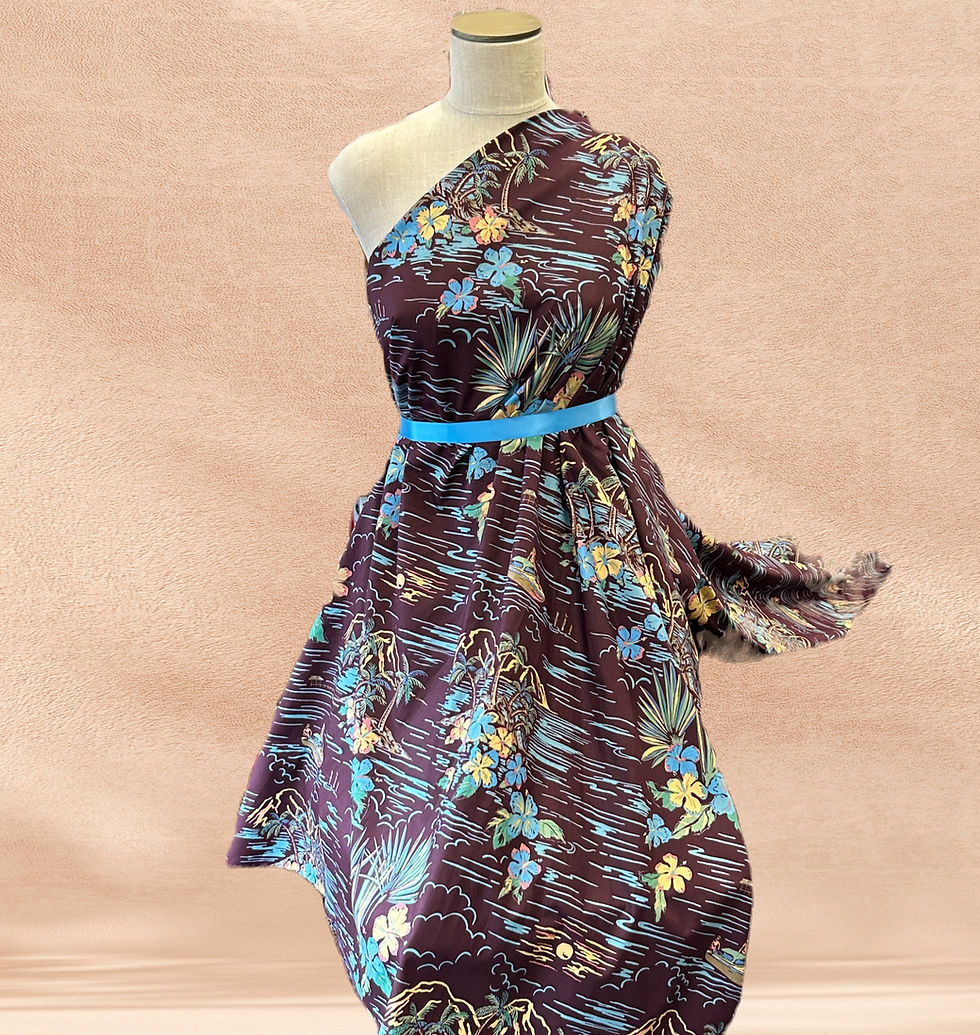 burgundy and blue tropical print fabric on a mannequin with a beige background