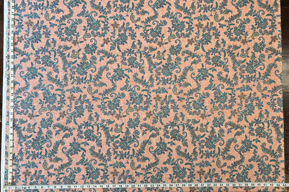 Thumbnail: blue and coral paisley floral fabric with a tape measure