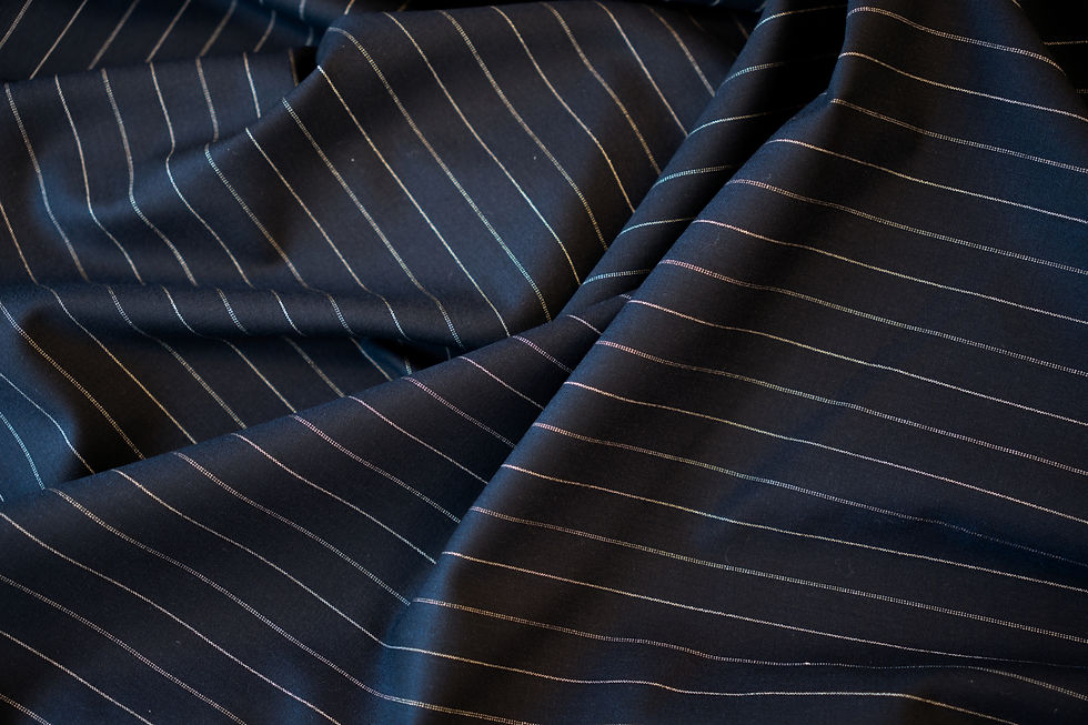 Thumbnail: wool and lycra navy and ivory pinstripe fabric swirled