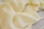 ivory pleated poly crpe de chine fabric swirled