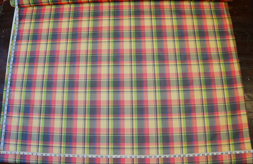 silk organza plaid fabric with a tape measure