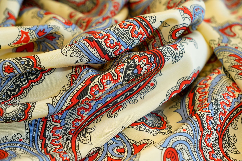 Thumbnail: red, blue and yellow rayon paisley fabric swirl
