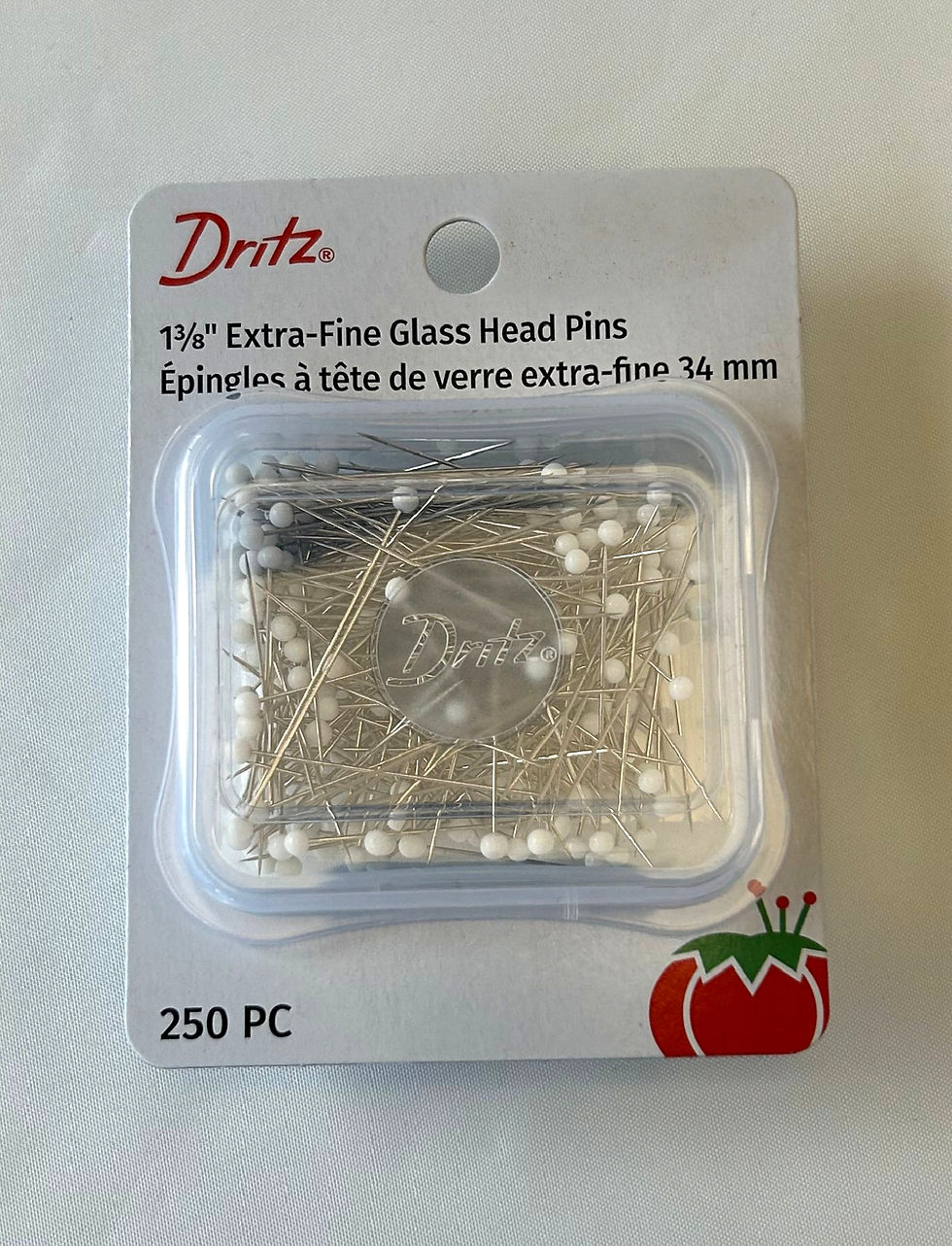 Dritz glass head, 1-3/8" inch pins in a package of 250. Extra fine. Banksville recommend best buy because glass head doesn't melt when ironed.