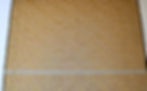 rust gold black organza fabric with a tape measure