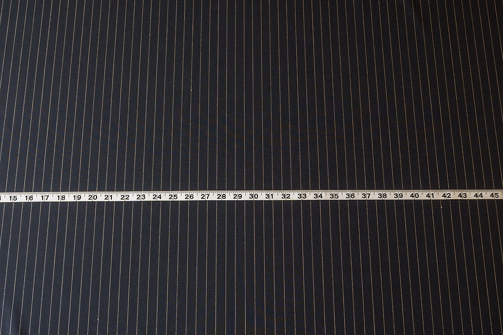 Thumbnail: midnight wool with ivory stripe fabric and tape measure