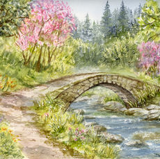 Watercolor painting of a stone bridge over a stream with pink flowering trees and forest background