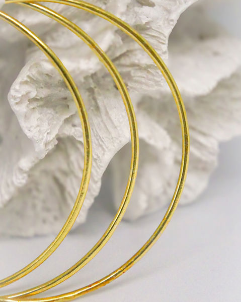 Gold handmade bangles Cornwall