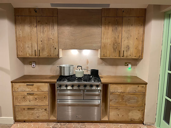 Kitchen made out of cheese boards.JPG