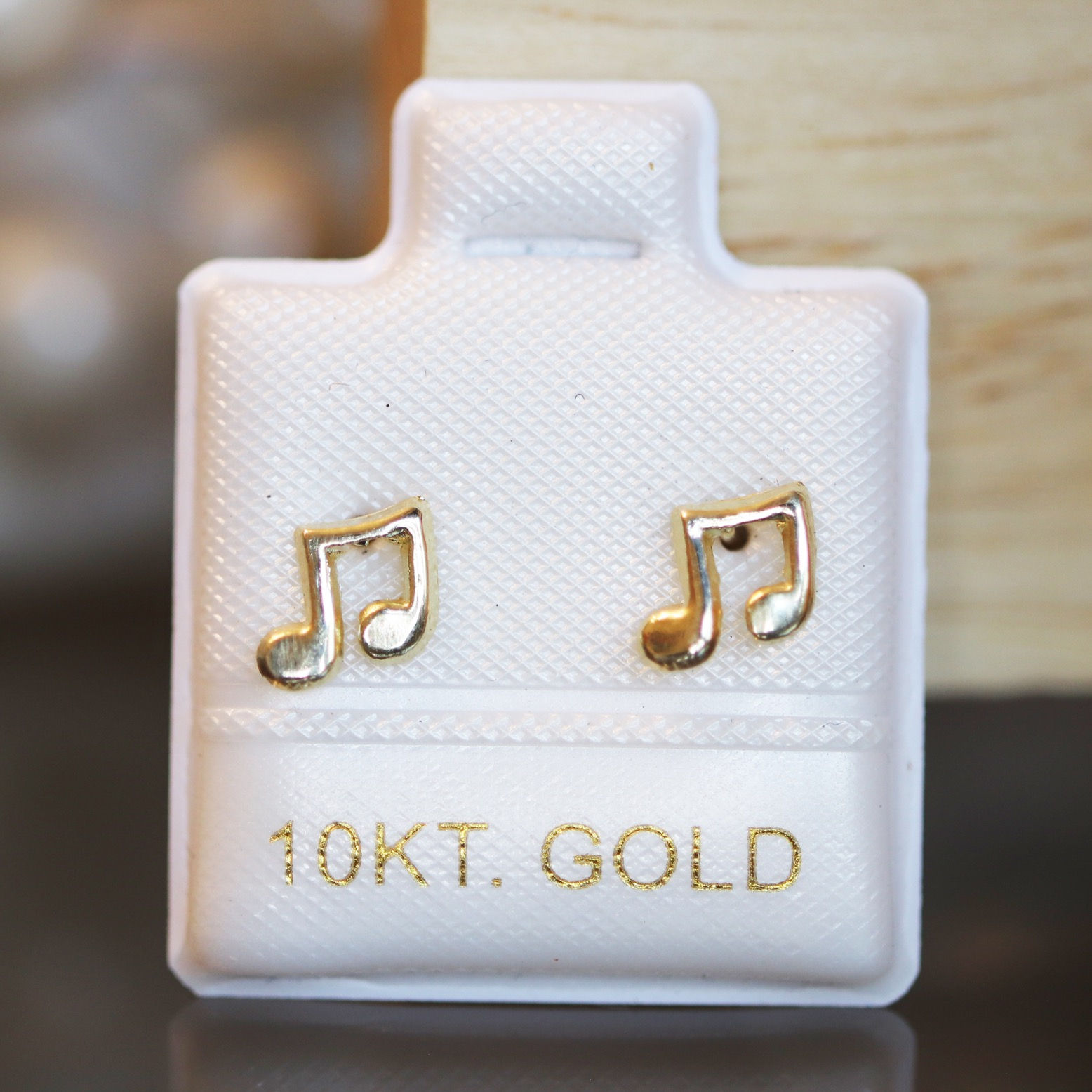 BOC309 Broquel oro 10k nota musical