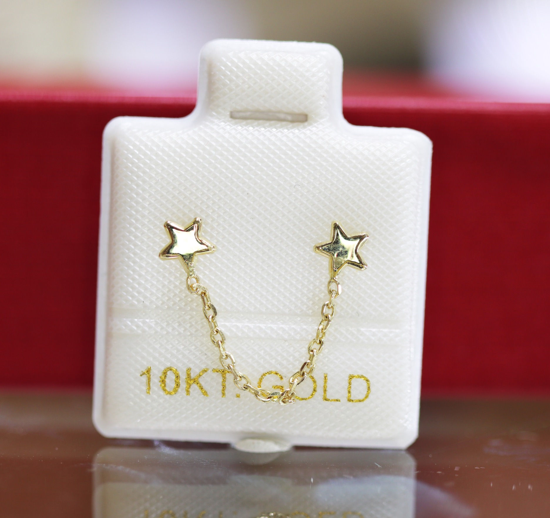 BOC211 Broquel Oro 10K cadenita doble estrella (Pieza)